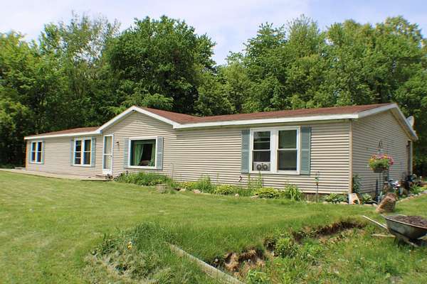 6 Acres of Land with Home for Sale in Munith, Michigan