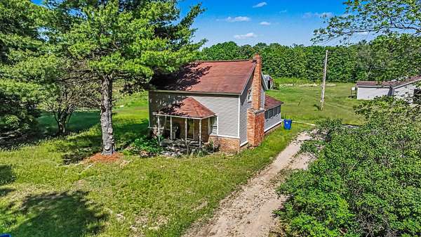 39.4 Acres of Recreational Land with Home for Sale in Otsego, Michigan