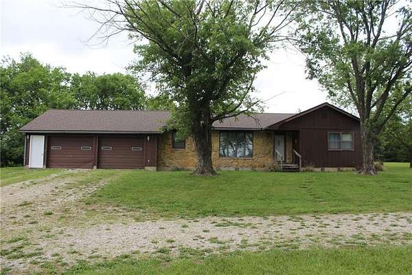 12.4 Acres of Land with Home for Sale in Iola, Kansas
