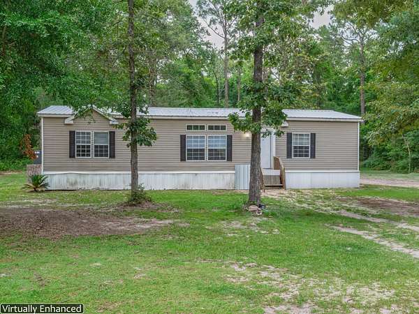 6.78 Acres of Land with Home for Sale in Tallahassee, Florida