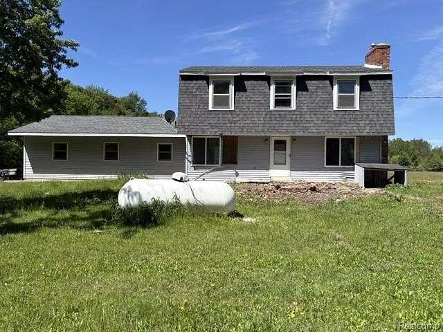 5 Acres of Land with Home for Sale in Putnam Township, Michigan