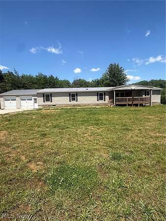 2 Acres of Land with Home for Sale in Kimbolton, Ohio
