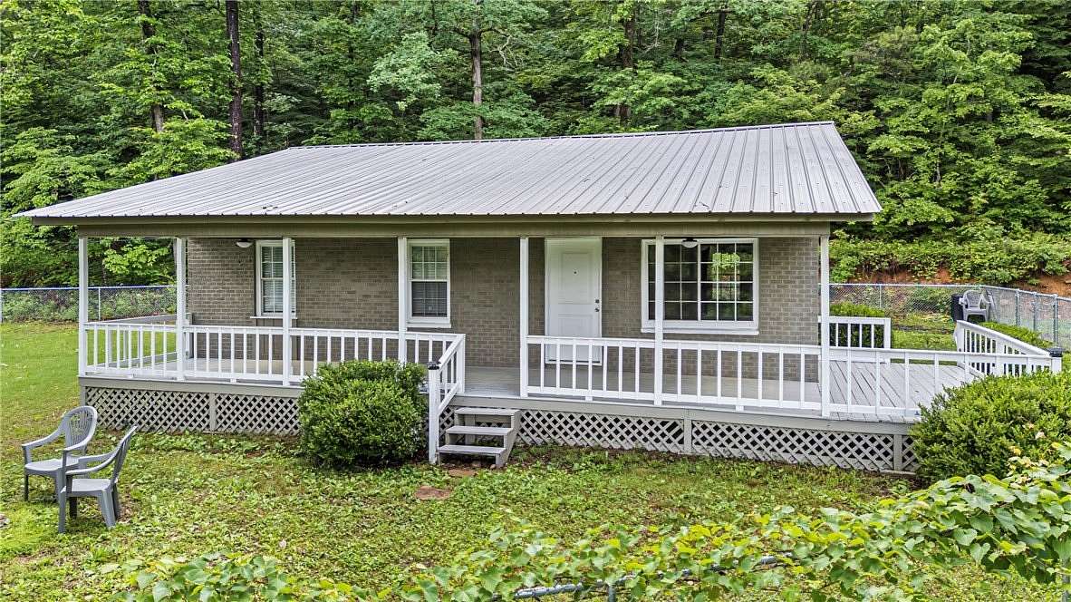 4.5 Acres of Land with Home for Sale in Ozone, Arkansas
