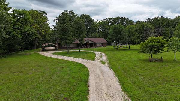4.39 Acres of Land with Home for Sale in Shell Knob, Missouri