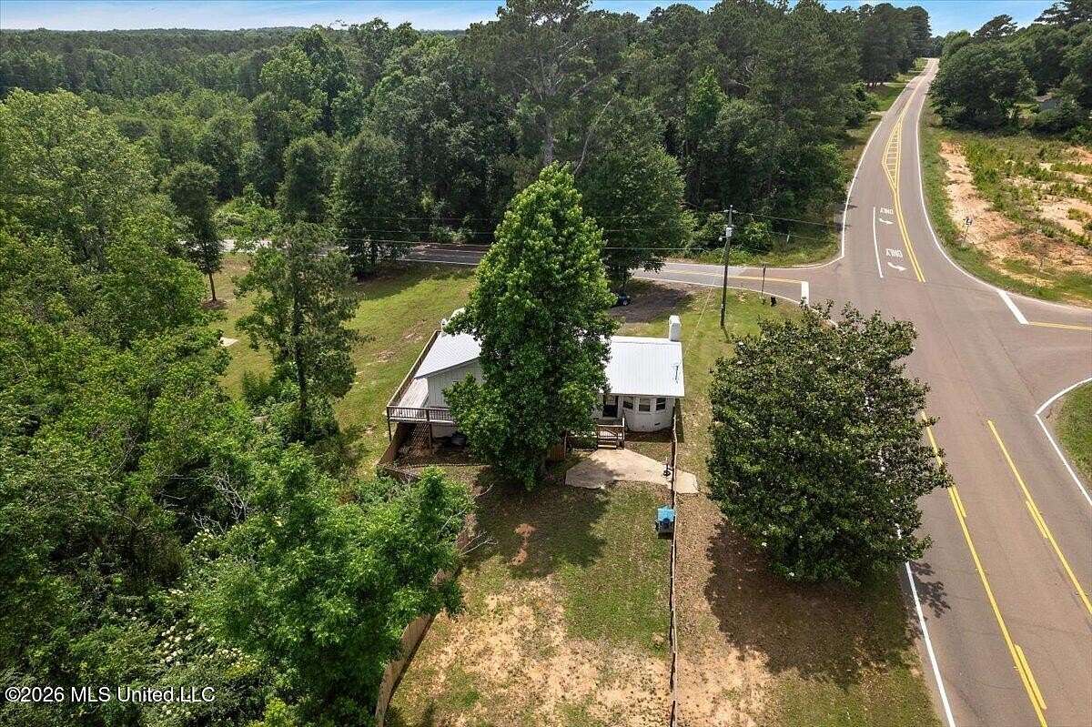 4.8 Acres of Land with Home for Sale in Magee, Mississippi
