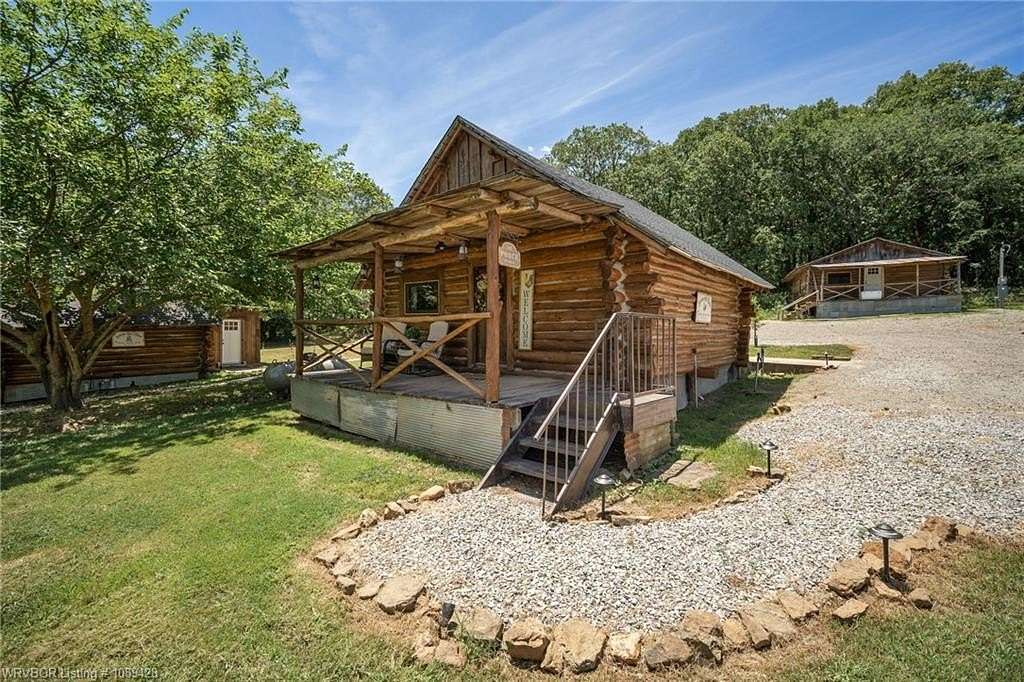 76 Acres of Land with Home for Sale in Rudy, Arkansas