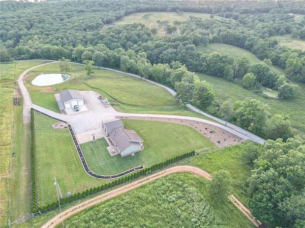 10.4 Acres of Land with Home for Sale in Huntsville, Arkansas