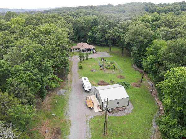 5 Acres of Land with Home for Sale in Flippin, Arkansas