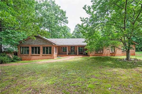 115 Acres of Land with Home for Sale in Hull, Georgia