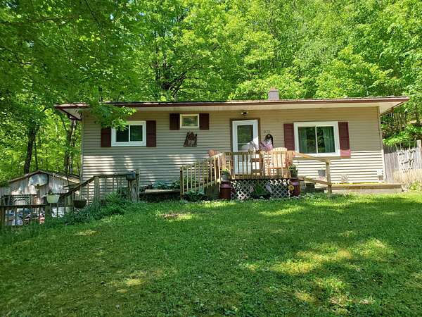 5 Acres of Land with Home for Sale in Stanwood, Michigan