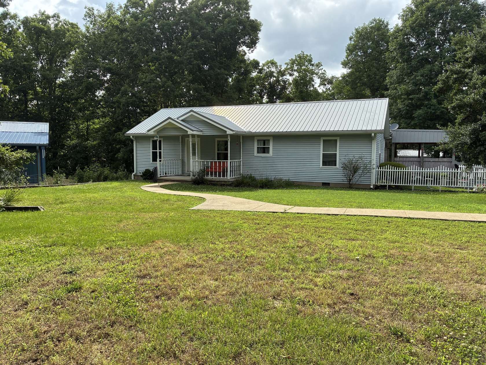 20.8 Acres of Recreational Land with Home for Sale in Summertown, Tennessee