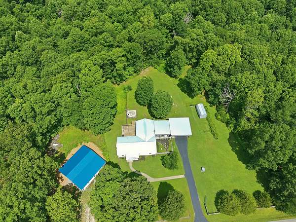20.8 Acres of Recreational Land with Home for Sale in Summertown, Tennessee