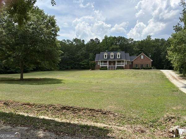 3.9 Acres of Land with Home for Sale in Tyrone, Georgia