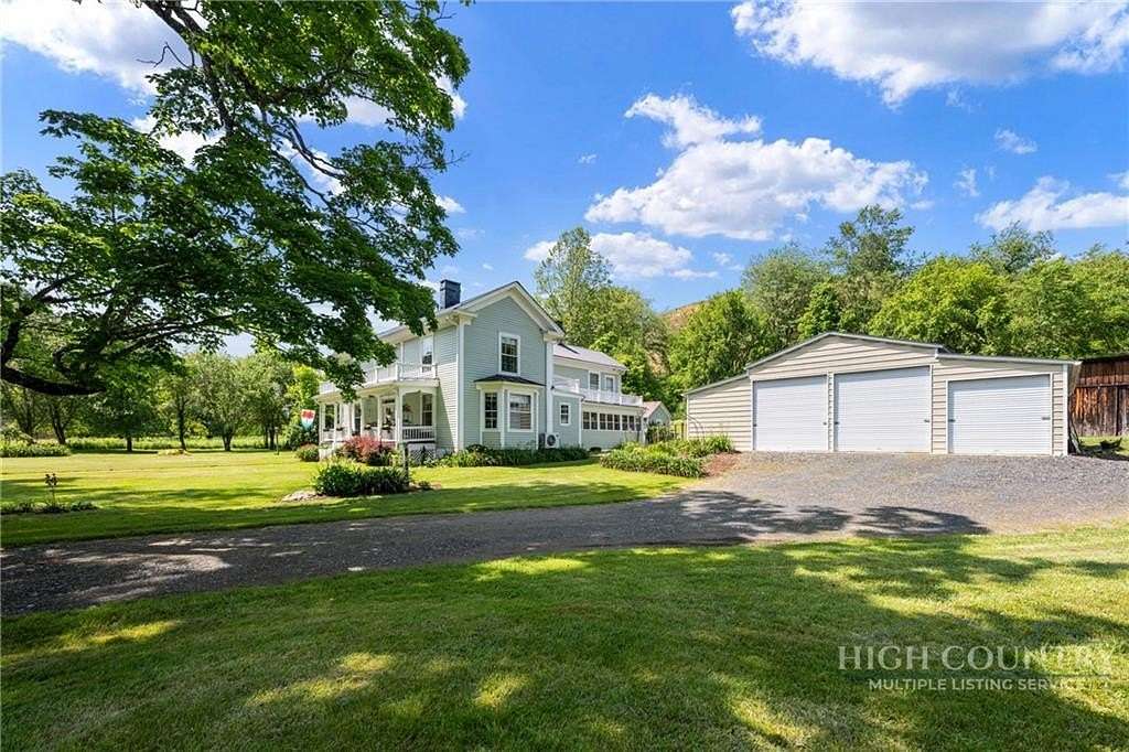 3.79 Acres of Land with Home for Sale in Lansing, North Carolina