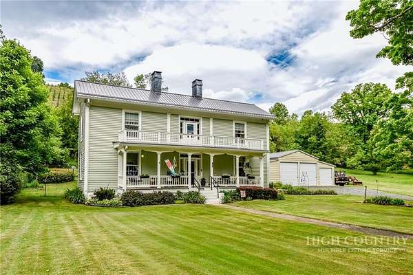 3.79 Acres of Land with Home for Sale in Lansing, North Carolina