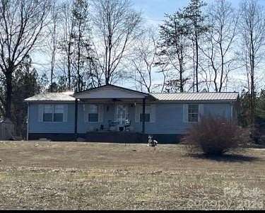 6.47 Acres of Land with Home for Sale in Forest City, North Carolina