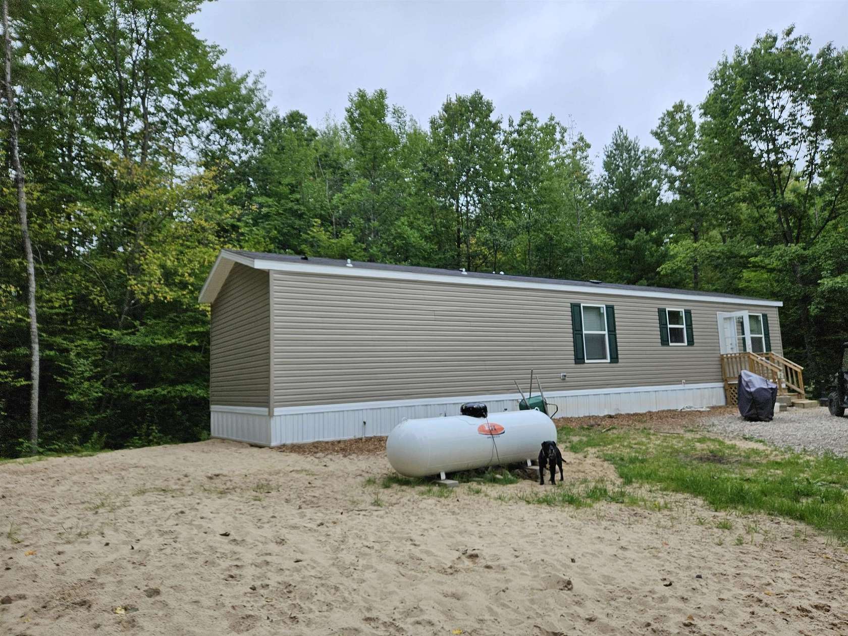 9.7 Acres of Land with Home for Sale in Harrison, Michigan