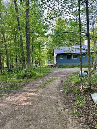 35 Acres of Recreational Land with Home for Sale in Crystal Falls, Michigan