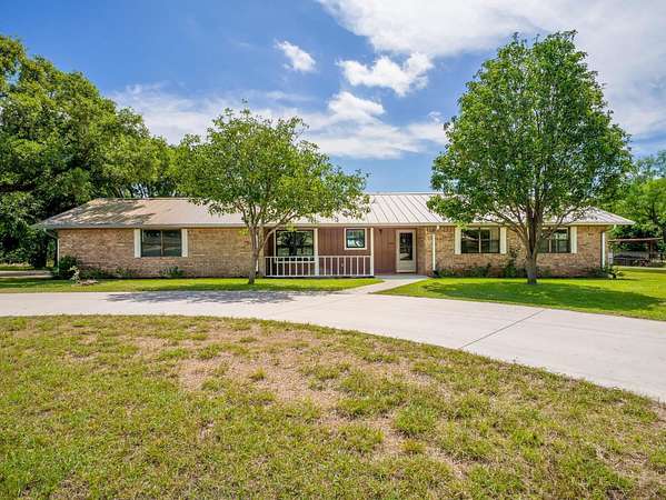5 Acres of Land with Home for Sale in Marble Falls, Texas