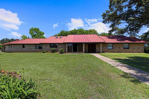 32.3 Acres of Land with Home for Sale in Marshall, Texas