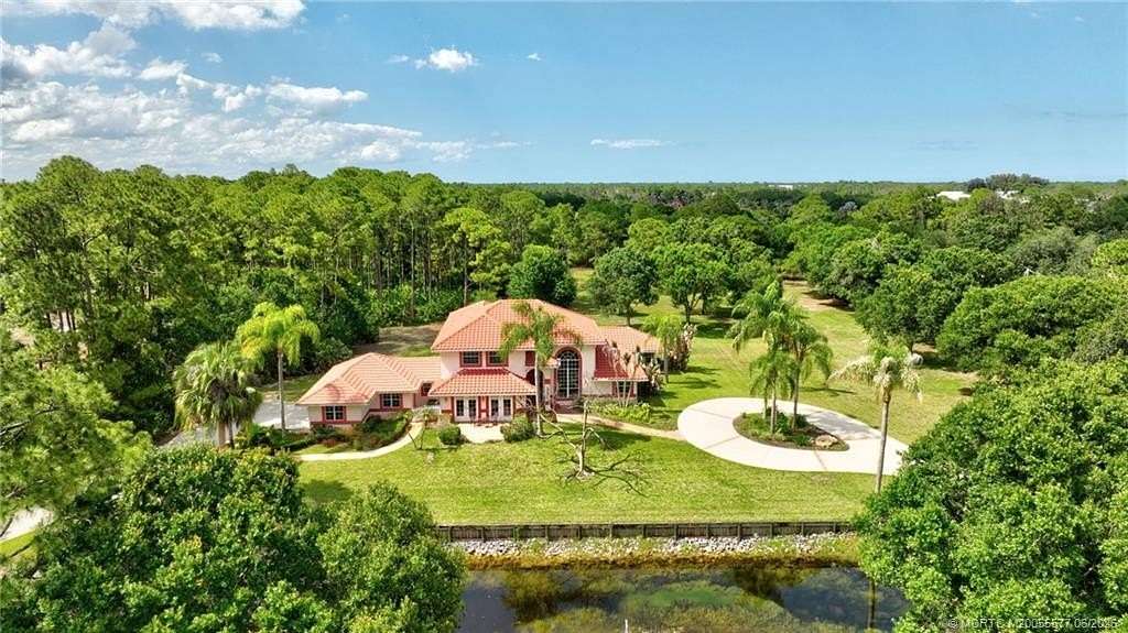 4.58 Acres of Land with Home for Sale in Palm City, Florida