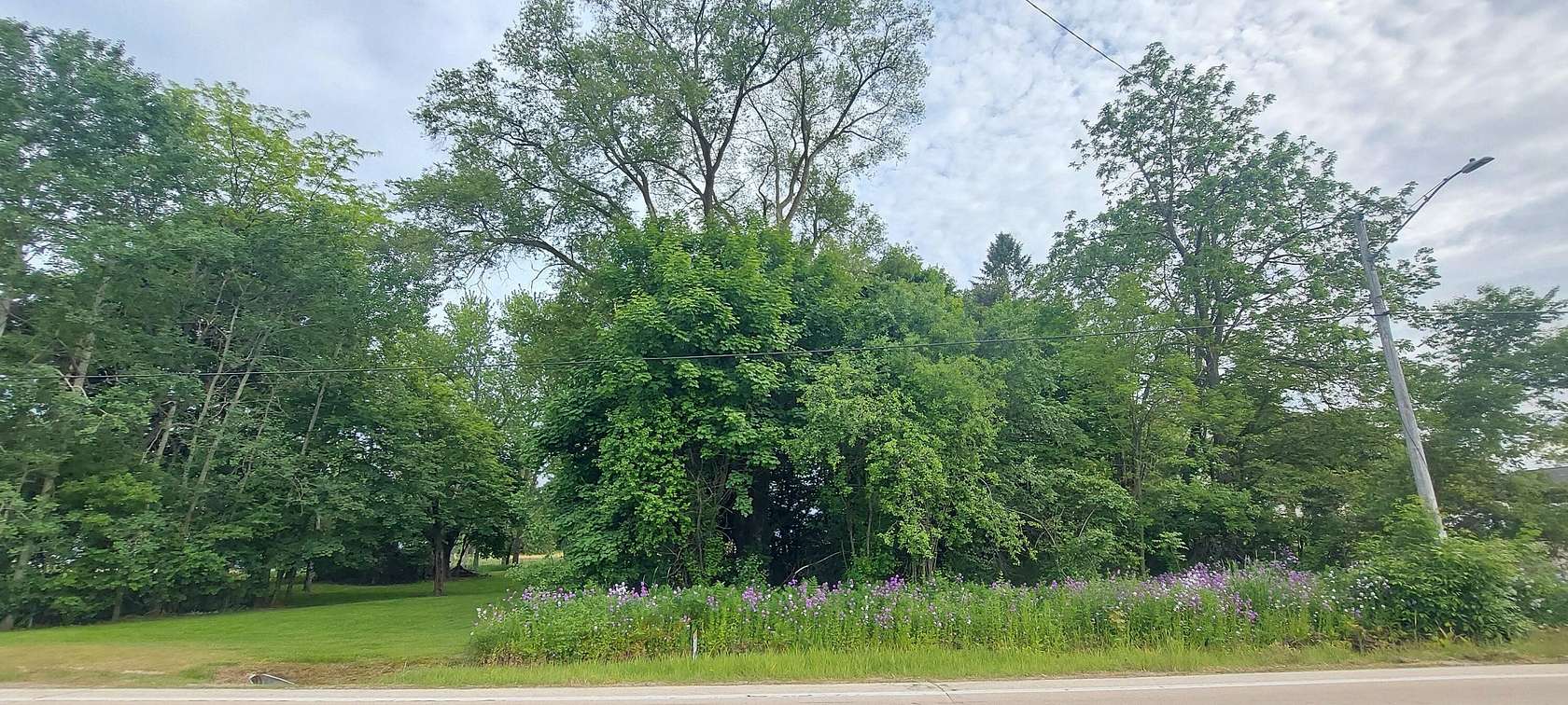 0.24 Acres of Residential Land for Sale in Oconomowoc, Wisconsin