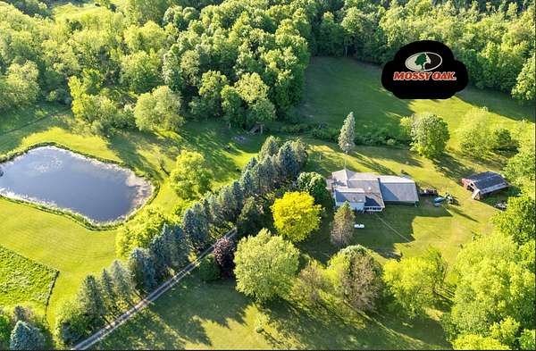 20 Acres of Recreational Land with Home for Sale in Manitou Beach, Michigan
