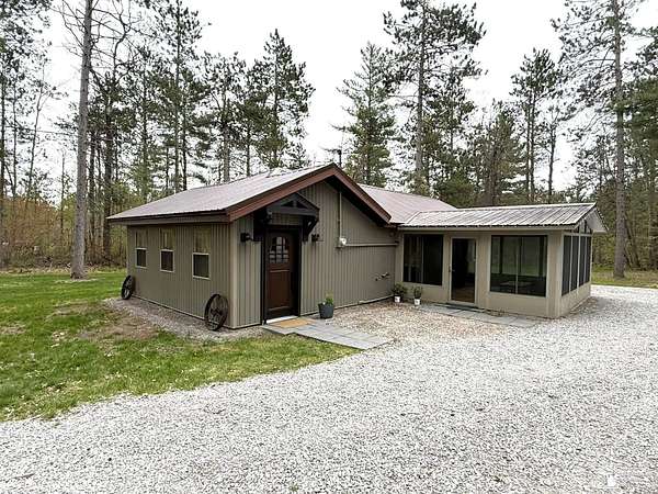 4.83 Acres of Land with Home for Sale in Lewiston, Michigan