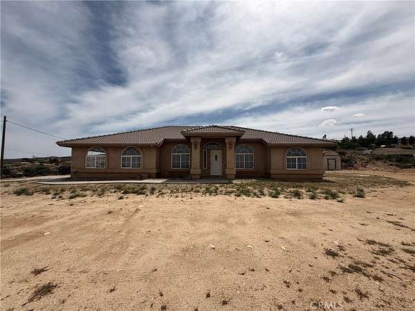 2.14 Acres of Land with Home for Lease in Phelan, California