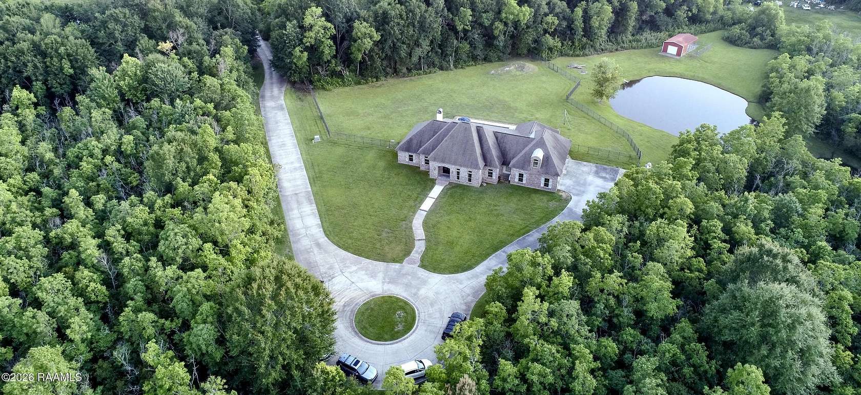 10.6 Acres of Land with Home for Sale in Scott, Louisiana