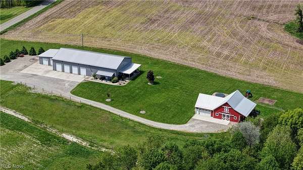 7.34 Acres of Land with Home for Auction in Beach City, Ohio