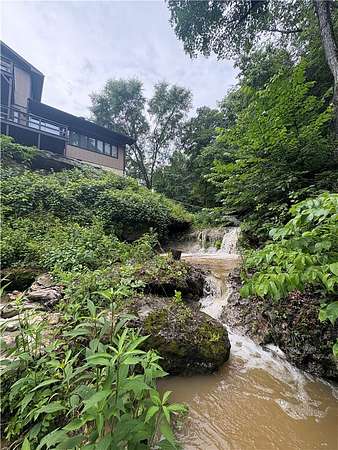 66.5 Acres of Recreational Land with Home for Sale in Eureka Springs, Arkansas