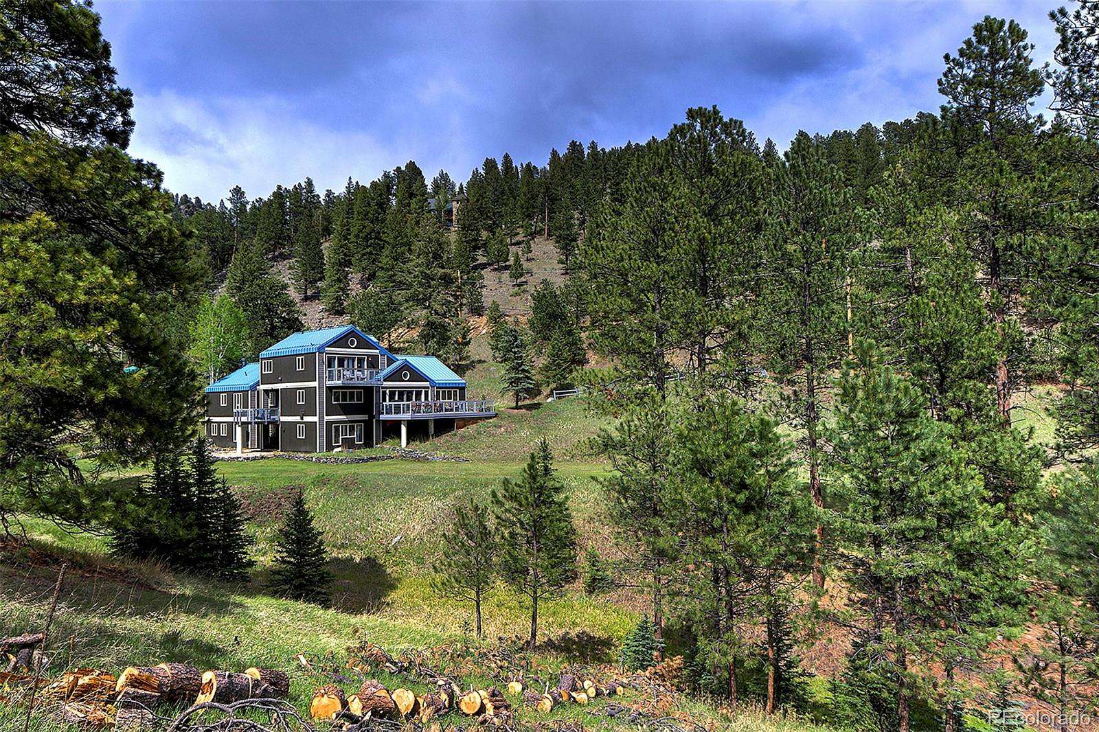 1.5 Acres of Land with Home for Sale in Evergreen, Colorado