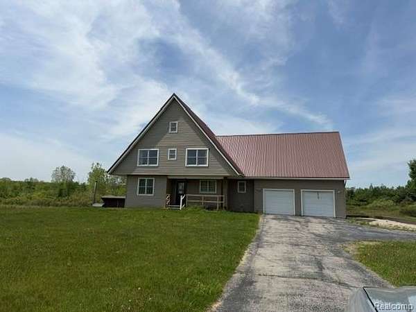 2.5 Acres of Land with Home for Sale in Emmett Township, Michigan