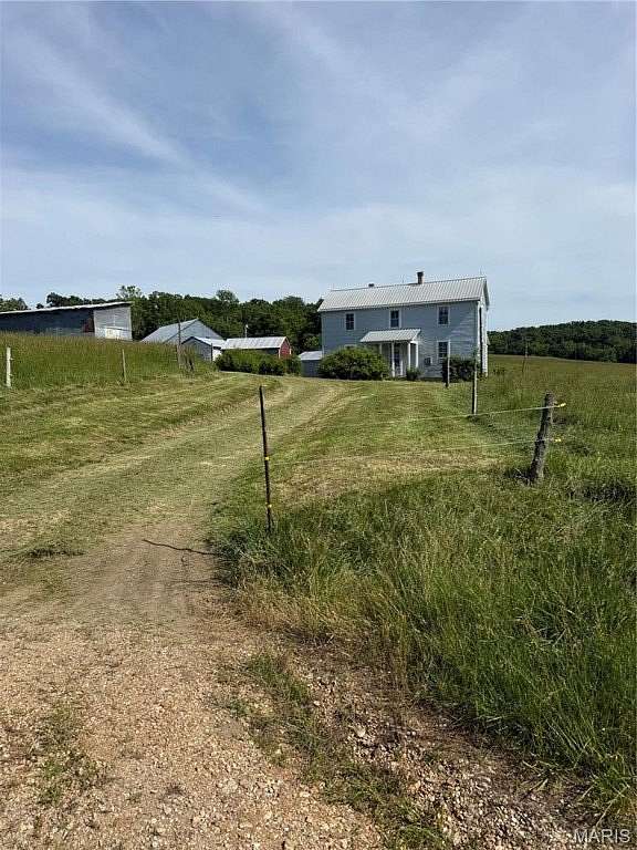 3.2 Acres of Land with Home for Sale in Loose Creek, Missouri