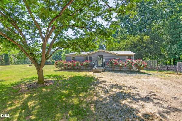 7.87 Acres of Land with Home for Sale in Henderson, North Carolina