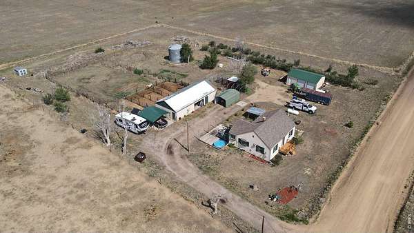 2.5 Acres of Land with Home for Sale in Wiggins, Colorado