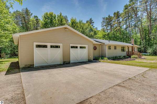 11.5 Acres of Recreational Land with Home for Sale in Alger, Michigan