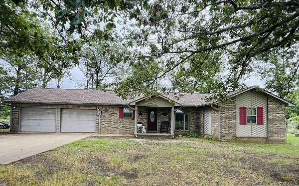 20.7 Acres of Land with Home for Sale in Leola, Arkansas