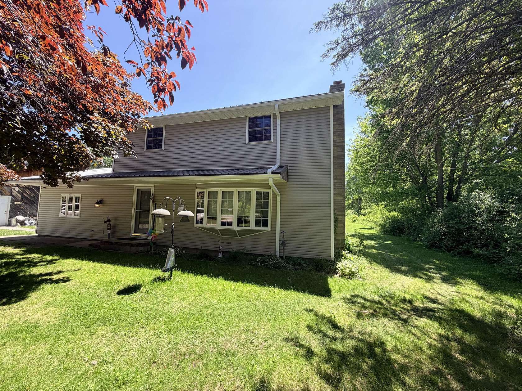 3.73 Acres of Land with Home for Sale in Twin Lake, Michigan