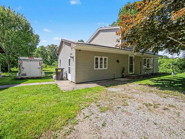 3.73 Acres of Land with Home for Sale in Twin Lake, Michigan