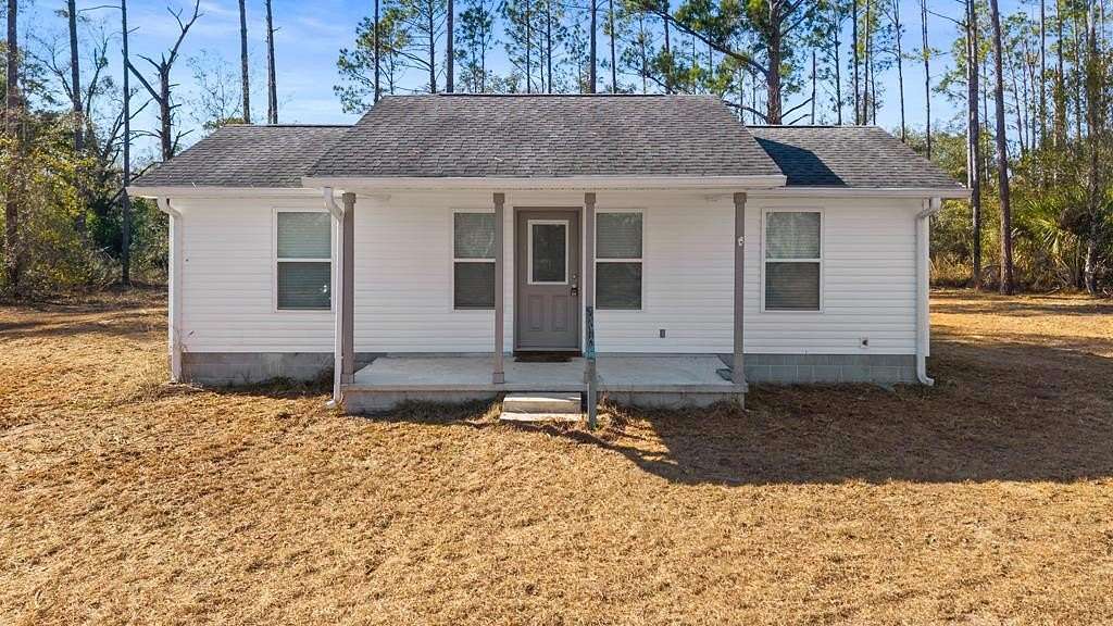 2.39 Acres of Land with Home for Sale in Perry, Florida