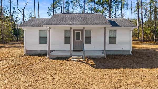 2.39 Acres of Land with Home for Sale in Perry, Florida