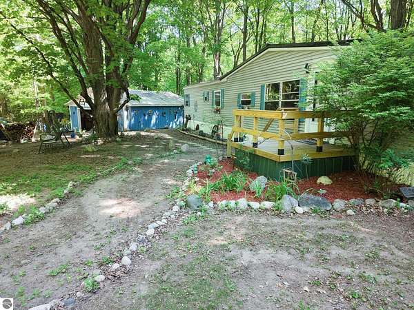 10.2 Acres of Recreational Land with Home for Sale in Copemish, Michigan