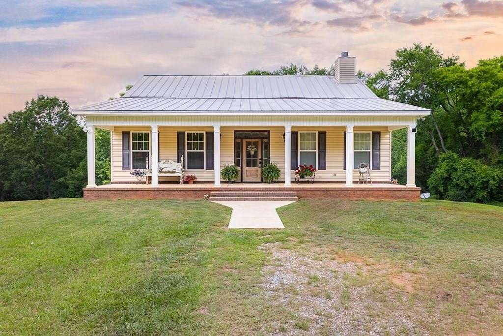 204 Acres of Land with Home for Sale in Skipperville, Alabama