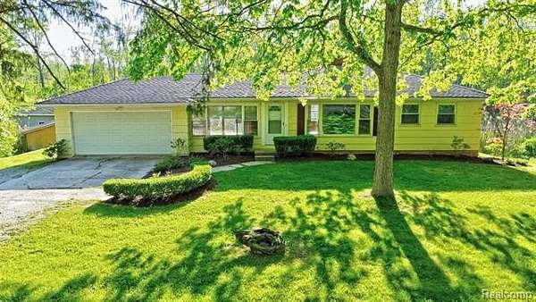 4.87 Acres of Land with Home for Sale in Groveland Township, Michigan