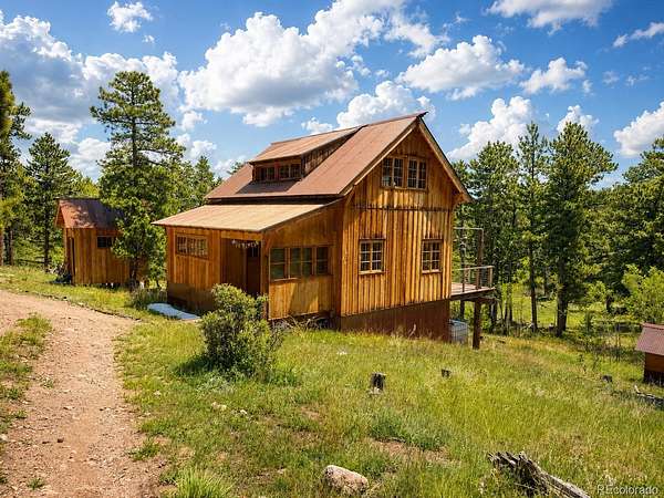 35 Acres of Land with Home for Sale in Red Feather Lakes, Colorado