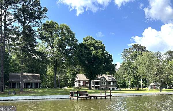 3.47 Acres of Land with Home for Sale in Sharpsburg, Georgia
