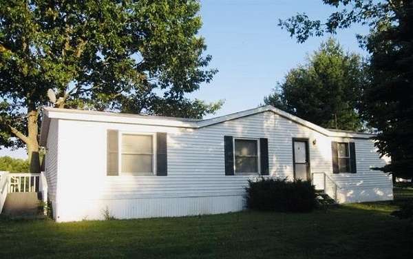 2 Acres of Land with Home for Sale in Sand Lake, Michigan