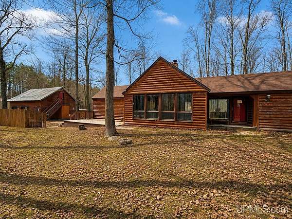 40 Acres of Land with Home for Sale in Powers, Michigan
